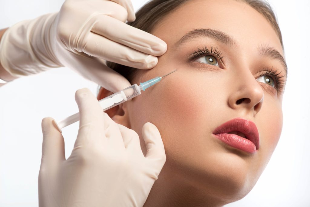 Cute girl taking Injectable | Neuromodulators at Cultivated Beauty Aesthetic in Guntersville, AL