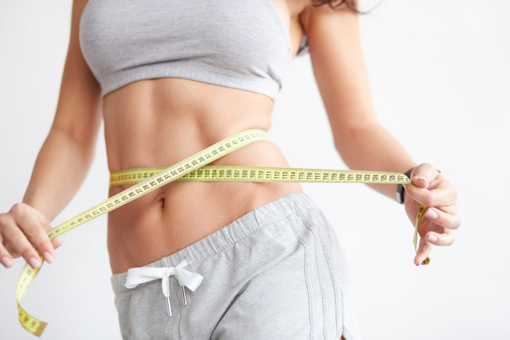Portrait of a Woman with slim tummy | Weight Management at Cultivated Beauty Aesthetic in Guntersville, AL