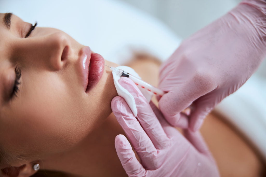 A Lady getting Lip fillers | Get Dermal Fillers at Cultivated Beauty Aesthetic in Guntersville, AL
